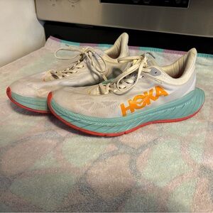 Hoka White Running Shoes with Teal Midsole and Orange Logo